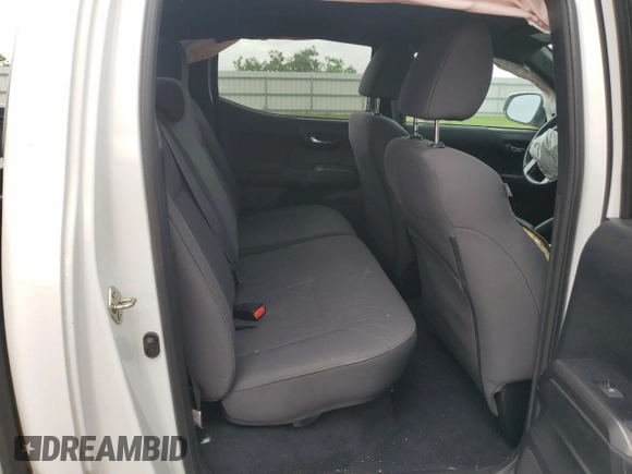 2019 Toyota Tacoma SR z VIN 3TMCZ5AN5KM242521, wystawiony jako Copart lot #55167485 z przebiegiem Nie podano mil oraz Szkoda całkowita • Salvage title. Historia ofert i sprzedaży dostępna na DreamBid. Obrazek 10.