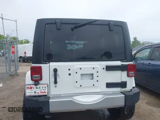 2015 Jeep Wrangler Unlimited Sahara с VIN 1C4BJWEG1FL506393, выставлен на аукционе IAAI как лот 42326900 с пробегом 100 538 миль миль и . История ставок и продаж доступна на DreamBid. Изображение 16.