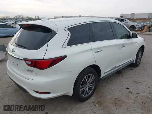 2020 Infiniti QX60 Pure with VIN 5N1DL0MN2LC531102, listed as a IAAI auction lot 41918887 with 55,284 mi miles and . Bid and sale history available at DreamBid. Image 4.