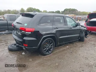 2022 Jeep Grand Cherokee Laredo X with VIN 1C4RJEAG0NC126796, listed as a IAAI auction lot 40755171 with 50,159 mi miles and . Bid and sale history available at DreamBid. Image 4.
