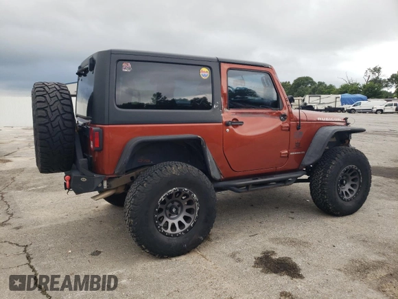 2014 Jeep Wrangler Rubicon with VIN 1C4BJWCG2EL303420, listed as a Copart auction lot 63550985 with 87,175 mi miles and Salvage title. Bid and sale history available at DreamBid. Image 3.