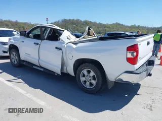 2014 Toyota Tundra 4WD Truck SR5 with VIN 5TFDW5F1XEX390763, listed as a IAAI auction lot 41973864 with 117,369 mi miles. Bid and sale history available at carsss.com. Image 3.
