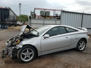 2000 Toyota Celica GTS z VIN JTDDY32T8Y0012279, wystawiony jako Copart lot #51768935 z przebiegiem 129 520 mil mil oraz Szkoda całkowita • Salvage title. Historia ofert i sprzedaży dostępna na DreamBid. Obrazek 1.