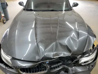 2015 BMW Z4 sDrive28i with VIN WBALL5C52FP557059, listed as a Copart auction lot 71438184 with 0 mi miles and Salvage Title. Bid and sale history available at carsss.com. Image 11.