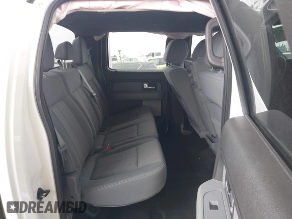 2014 Ford F-150 XL with VIN 1FTFW1CT1EKE22892, listed as a IAAI auction lot 42172851 with 14,203 mi miles and . Bid and sale history available at DreamBid. Image 8.