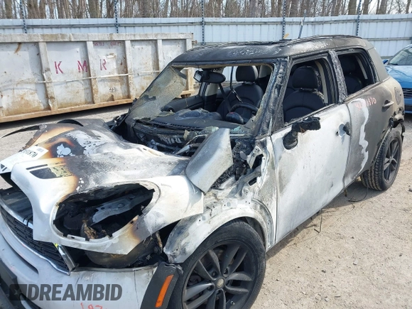 2014 MINI Countryman S with VIN WMWZC3C55EWT00416, listed as a IAAI auction lot 42031870 with Not Provided miles and . Bid and sale history available at DreamBid. Image 6.