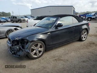2010 BMW 1 Series 128i with VIN WBAUL7C54AVJ77774, listed as a Copart auction lot 50040934 with 144,757 mi miles and Salvage Title. Bid and sale history available at carsss.com. Image 1.
