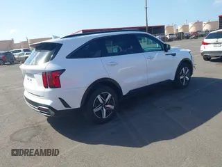 2023 Kia Sorento S with VIN 5XYRL4LC2PG235483, listed as a IAAI auction lot 41304494 with 9,660 mi miles and . Bid and sale history available at DreamBid. Image 4.