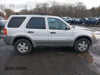 2002 Ford Escape XLT Choice with VIN 1FMYU04142KD82594, listed as a IAAI auction lot 41574646 with 173,174 mi miles. Bid and sale history available at carsss.com. Image 12.