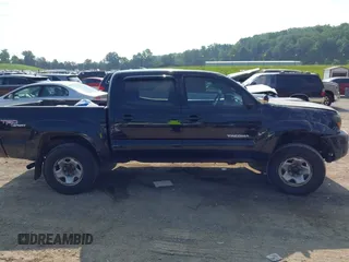 2011 Toyota Tacoma with VIN 3TMLU4EN4BM079699, listed as a IAAI auction lot 42446694 with 200,103 mi miles and . Bid and sale history available at DreamBid. Image 13.
