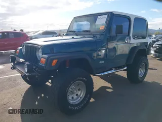 1998 Jeep Wrangler Sport with VIN 1J4FY19S7WP787679, listed as a IAAI auction lot 41764883 with 134,144 mi miles. Bid and sale history available at carsss.com. Image 17.