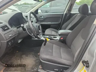 2012 Ford Fusion Hybrid z VIN 3FADP0L34CR227740, wystawiony jako Copart lot #64989475 z przebiegiem 134 862 mil mil oraz Szkoda całkowita • Salvage title. Historia ofert i sprzedaży dostępna na DreamBid. Obrazek 7.