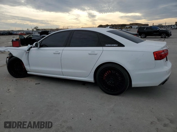 2015 Audi A6 3.0T Prestige with VIN WAUHGAFCXFN031884, listed as a Copart auction lot 41890843 with 136,077 mi miles. Bid and sale history available at carsss.com. Image 2.