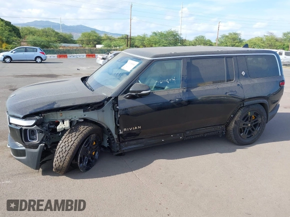 2023 Rivian R1S Adventure z VIN 7PDSGABA8PN020504, wystawiony jako IAAI lot #42025341 z przebiegiem 5989 mil mil oraz . Historia ofert i sprzedaży dostępna na DreamBid. Obrazek 15.