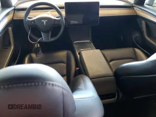 2023 Tesla Model 3 z VIN 5YJ3E1EA4PF458674, wystawiony jako Copart lot #60168815 z przebiegiem 49 007 mil mil oraz Szkoda całkowita • Salvage title. Historia ofert i sprzedaży dostępna na DreamBid. Obrazek 8.