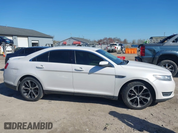 2014 Ford Taurus SEL z VIN 1FAHP2E81EG104137, wystawiony jako IAAI lot #42054432 z przebiegiem 146 046 mil mil oraz . Historia ofert i sprzedaży dostępna na DreamBid. Obrazek 13.