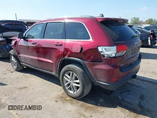 2017 Jeep Grand Cherokee Laredo with VIN 1C4RJEAG4HC674921, listed as a IAAI auction lot 41876971 with 115,773 mi miles. Bid and sale history available at carsss.com. Image 3.