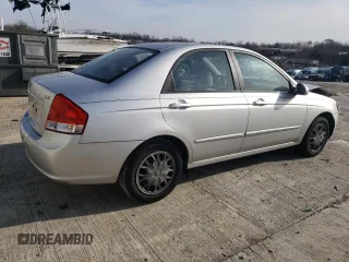 2009 Kia Spectra LX with VIN KNAFE221895659552, listed as a Copart auction lot 82555924 with 114,704 mi miles and Salvage Title. Bid and sale history available at carsss.com. Image 3.