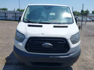 2018 Ford Transit with VIN 1FTYE1ZM3JKA22788, listed as a IAAI auction lot 42298271 with 325,277 mi miles and . Bid and sale history available at DreamBid. Image 6.