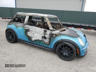 2005 MINI Hardtop S z VIN WMWRE33465TD90424, wystawiony jako Copart lot #50558185 z przebiegiem Nie podano mil oraz Nie do naprawy • Non repairable. Historia ofert i sprzedaży dostępna na DreamBid. Obrazek 4.