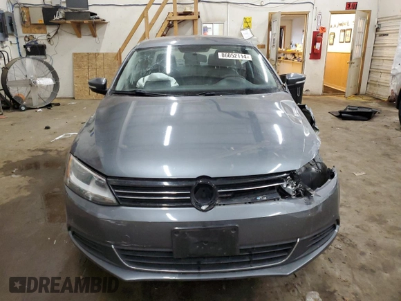 2013 Volkswagen Jetta SE with VIN 3VWDX7AJ2DM309725, listed as a Copart auction lot 86052114 with 70,828 mi miles and Salvage title. Bid and sale history available at DreamBid. Image 5.