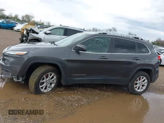 2014 Jeep Cherokee Altitude with VIN 1C4PJMCB2EW181848, listed as a IAAI auction lot 41638004 with 175,813 mi miles. Bid and sale history available at carsss.com. Image 14.