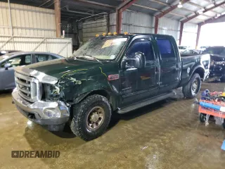 2002 Ford F-250 XL with VIN 1FTNW20F52EA52699, listed as a Copart auction lot 84088814 with 299,869 mi miles and Salvage Title. Bid and sale history available at DreamBid. Image 1.
