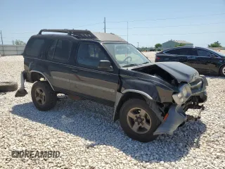 2003 Nissan Xterra XE with VIN 5N1ED28T33C660861, listed as a Copart auction lot 52981175 with 182,823 mi miles and Salvage Title. Bid and sale history available at DreamBid. Image 4.