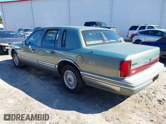 1994 Lincoln Town Car Signature z VIN 1LNLM82W4RY785151, wystawiony jako IAAI lot #41638398 z przebiegiem Nie podano mil oraz . Historia ofert i sprzedaży dostępna na DreamBid. Obrazek 6.