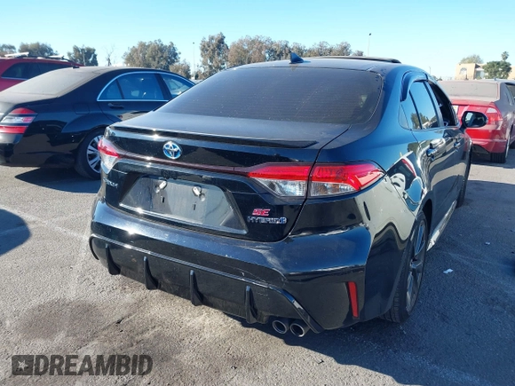 2023 Toyota Corolla Hybrid LE with VIN JTDBCMFE6P3001785, listed as a IAAI auction lot 41337266 with 25,829 mi miles. Bid and sale history available at carsss.com. Image 4.