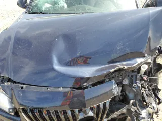 2016 Buick Regal Premium II with VIN 2G4GT5GX1G9119063, listed as a Copart auction lot 50596895 with 102,018 mi miles and Salvage title. Bid and sale history available at DreamBid. Image 13.