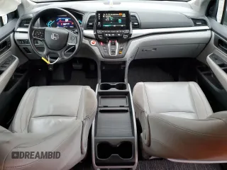 2021 Honda Odyssey EX-L with VIN 5FNRL6H70MB011669, listed as a Copart auction lot 43685815 with 77,542 mi miles and Salvage Title. Bid and sale history available at DreamBid. Image 8.