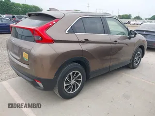 2020 Mitsubishi Eclipse Cross ES z VIN JA4AS3AAXLZ021438, wystawiony jako IAAI lot #41900181 z przebiegiem 91 306 mil mil oraz . Historia ofert i sprzedaży dostępna na DreamBid. Obrazek 4.