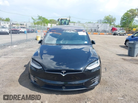 2019 Tesla Model X 75D with VIN 5YJXCBE21KF180203, listed as a IAAI auction lot 42190255 with 114,294 mi miles and . Bid and sale history available at DreamBid. Image 6.