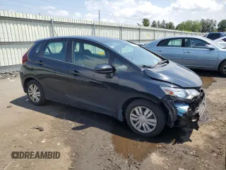 2015 Honda Fit LX with VIN 3HGGK5G55FM737094, listed as a Copart auction lot 64269965 with 78,792 mi miles and Salvage title. Bid and sale history available at DreamBid. Image 4.
