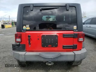 2014 Jeep Wrangler Sport with VIN 1C4AJWAG1EL143206, listed as a Copart auction lot 51167695 with 100,734 mi miles and Salvage Title. Bid and sale history available at carsss.com. Image 6.