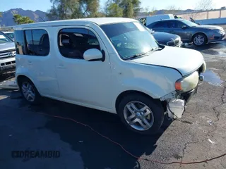 2010 Nissan Cube S z VIN JN8AZ2KR5AT165662, wystawiony jako IAAI lot #41839943 z przebiegiem 183 630 mil mil oraz . Historia ofert i sprzedaży dostępna na DreamBid. Obrazek 1.