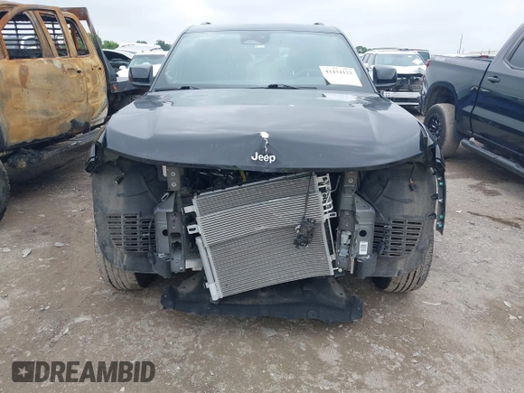 2024 Jeep Grand Cherokee Altitude with VIN 1C4RJGAG4R8514618, listed as a IAAI auction lot 42434122 with 26,236 mi miles and . Bid and sale history available at DreamBid. Image 6.