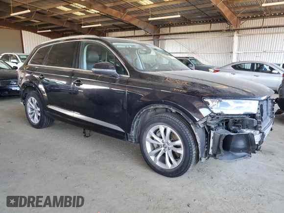 2019 Audi Q7 Premium with VIN WA1AAAF79KD034178, listed as a Copart auction lot 42302375 with 105,163 mi miles and Salvage title. Bid and sale history available at DreamBid. Image 4.