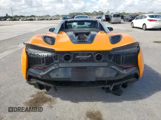 2025 McLaren Artura z VIN SBM16BEA8SW002943, wystawiony jako Copart lot #43462325 z przebiegiem Nie podano mil oraz Szkody całkowita. Historia ofert i sprzedaży dostępna na DreamBid. Obrazek 6.