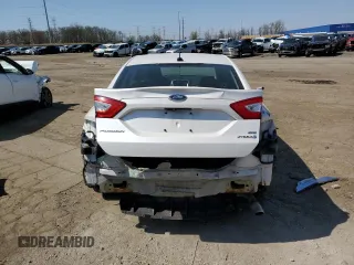 2015 Ford Fusion SE Hybrid with VIN 3FA6P0LU7FR154952, listed as a Copart auction lot 54192465 with 490,431 mi miles and Clean Title. Bid and sale history available at carsss.com. Image 6.