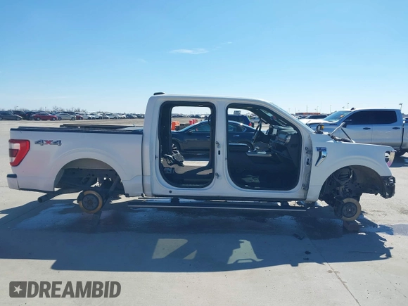 2021 Ford F-150 XL с VIN 1FTFW1E83MFB03929, выставлен на аукционе IAAI как лот 41629520 с пробегом Не указан миль и . История ставок и продаж доступна на DreamBid. Изображение 12.