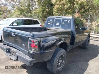 1999 Ford Ranger XL with VIN 1FTZR15V3XPB55652, listed as a IAAI auction lot 41892631 with 238,995 mi miles. Bid and sale history available at carsss.com. Image 4.