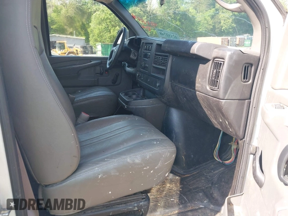2014 Chevrolet Express Cargo Van with VIN 1GCWGFCG0E1100859, listed as a IAAI auction lot 42142748 with 182,900 mi miles. Bid and sale history available at carsss.com. Image 5.