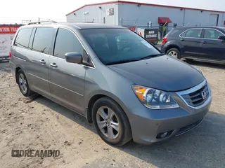 2008 Honda Odyssey Touring z VIN 5FNRL38978B047803, wystawiony jako IAAI lot #42427855 z przebiegiem 125 697 mil mil oraz . Historia ofert i sprzedaży dostępna na DreamBid. Obrazek 1.