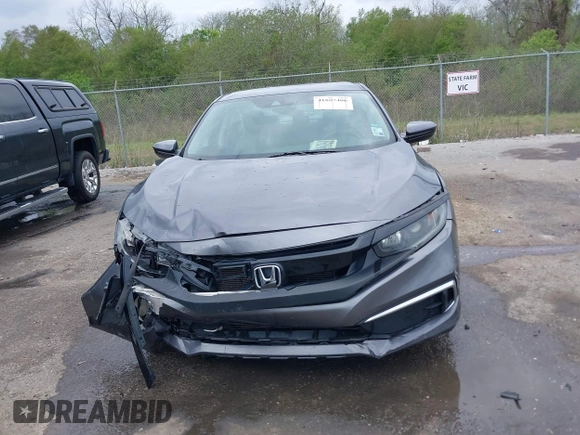 2019 Honda Civic LX with VIN 19XFC2F68KE007409, listed as a IAAI auction lot 41887406 with 57,147 mi miles and . Bid and sale history available at DreamBid. Image 12.