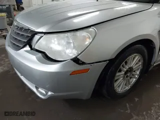 2008 Chrysler Sebring Touring with VIN 1C3LC56K78N275328, listed as a IAAI auction lot 41811526 with 195,457 mi miles. Bid and sale history available at carsss.com. Image 19.