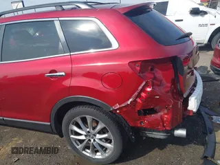 2015 Mazda CX-9 Grand Touring with VIN JM3TB3DA7F0448943, listed as a IAAI auction lot 41888414 with 104,052 mi miles. Bid and sale history available at carsss.com. Image 17.