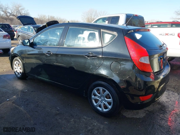 2013 Hyundai Accent GL with VIN KMHCT5AE6DU128989, listed as a IAAI auction lot 41744428 with 92,102 mi miles. Bid and sale history available at carsss.com. Image 3.