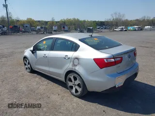 2014 Kia Rio EX with VIN KNADN4A34E6352924, listed as a IAAI auction lot 42072886 with 1 mi miles. Bid and sale history available at carsss.com. Image 3.
